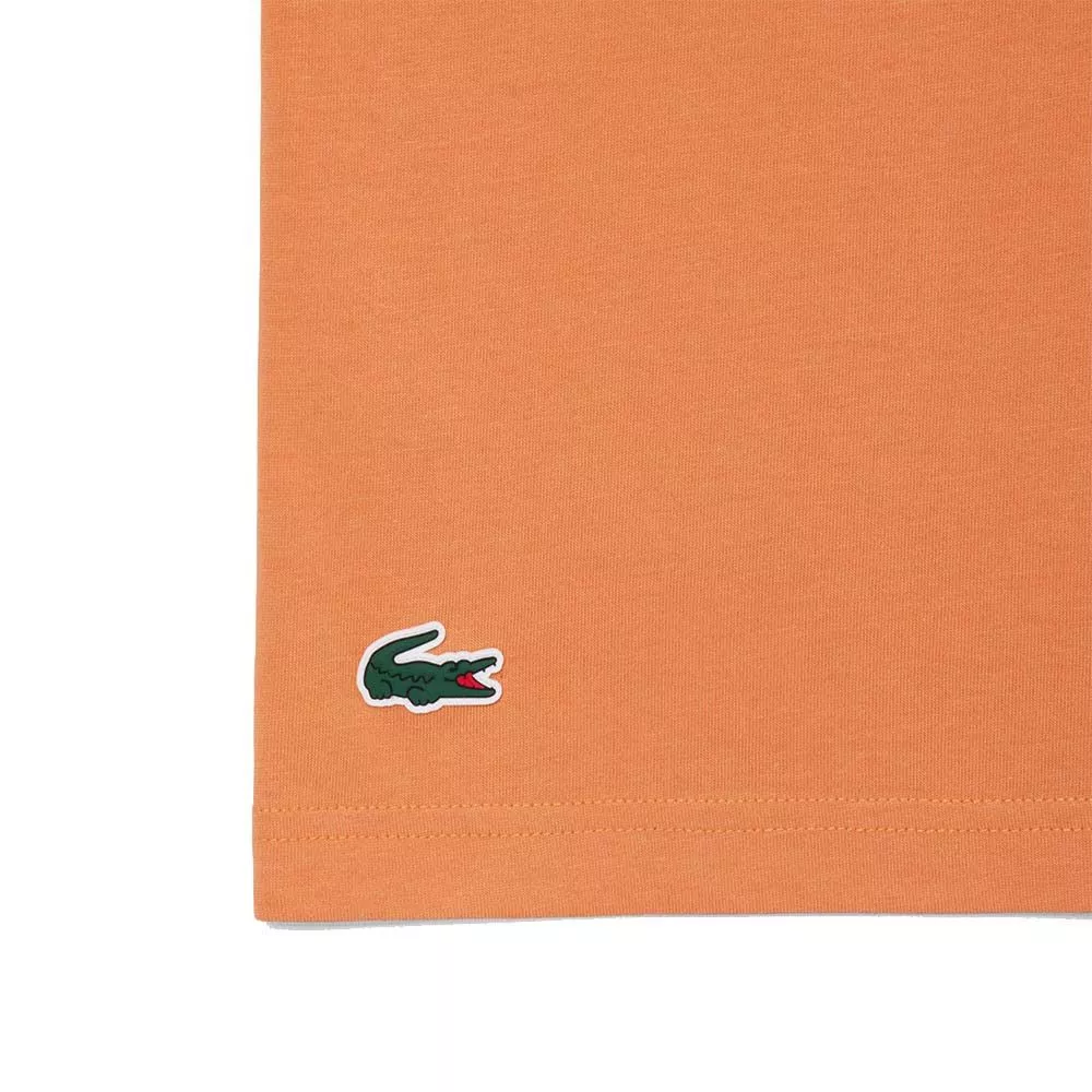 Lacoste Tennis x Novak Djokovic pack T-shirt + pet oranje