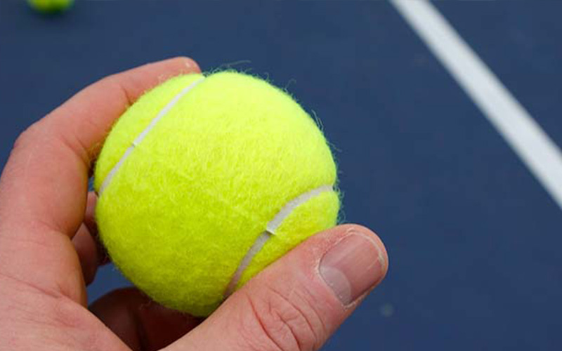 Hoeveel weegt een tennisbal?